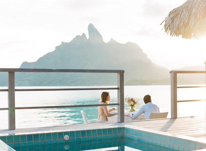 Elope in Bora Bora in an overwater bungalow - Sunset time before diner with the couple