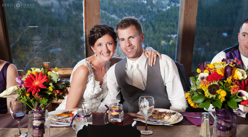 Couple eats dinner in the Traverse Restaurant at their Lodge at Breckenridge wedding in Colorado