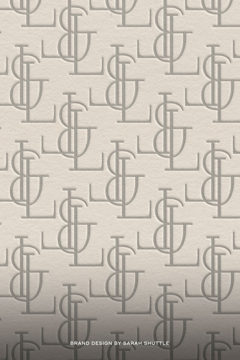 Embossed monogram pattern for Love & Luxury Events in soft neutral tones