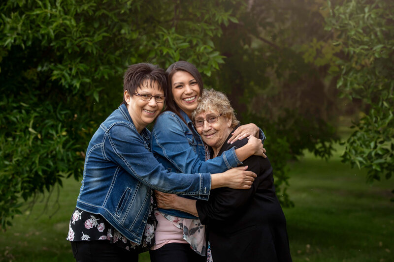 3 generations of indigenous women hugging