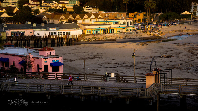 Capitola Village, Beach, Wharf and Venetian Hotel at sunset.