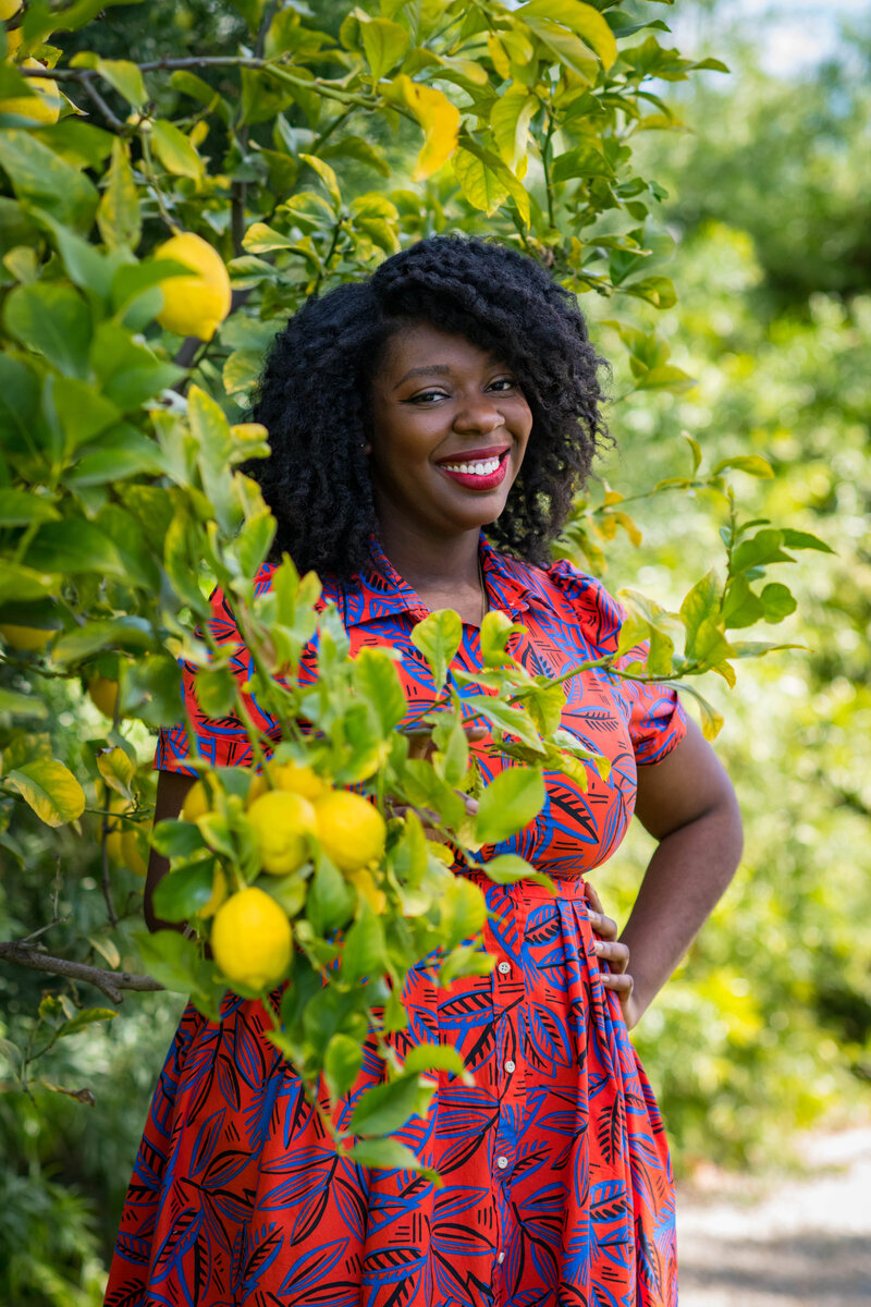 Krystal posing by a lemon tree