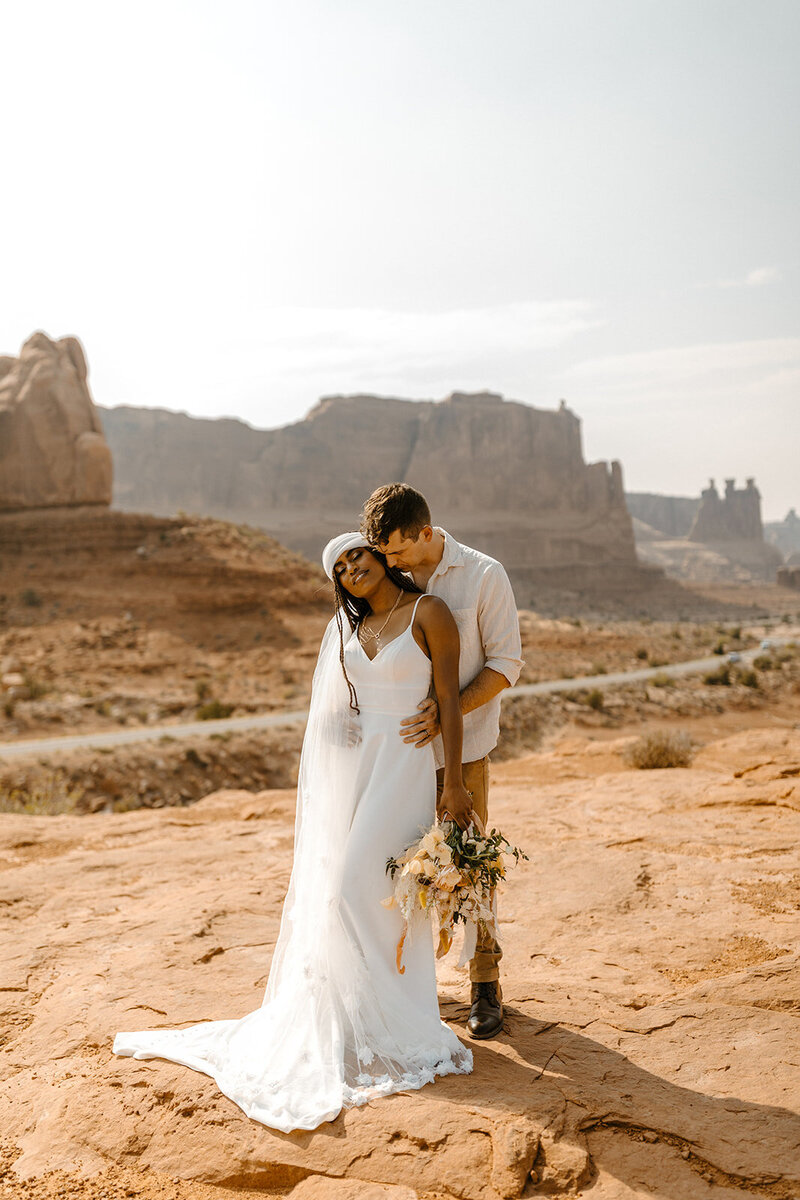 Couple portraits during their Utah Elopement in Arches National Park.
