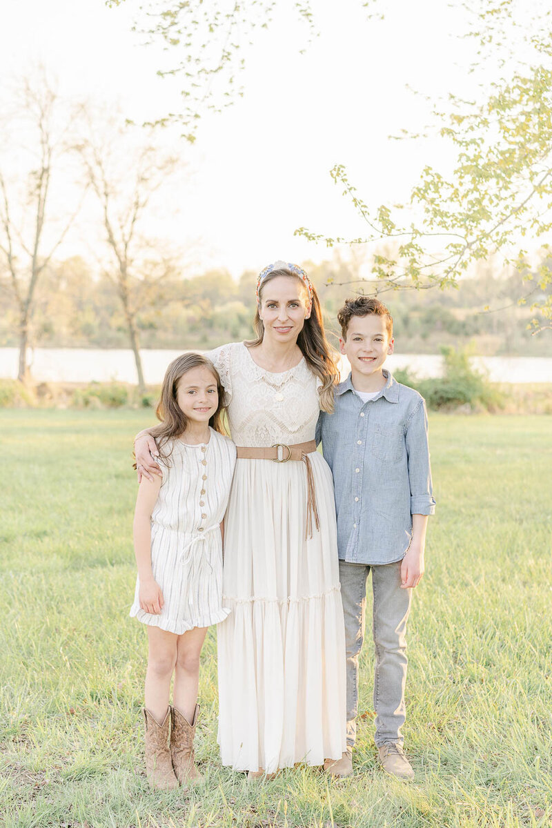 full body of mom with kids during spring mini session by a Haymarket, Virginia photographer