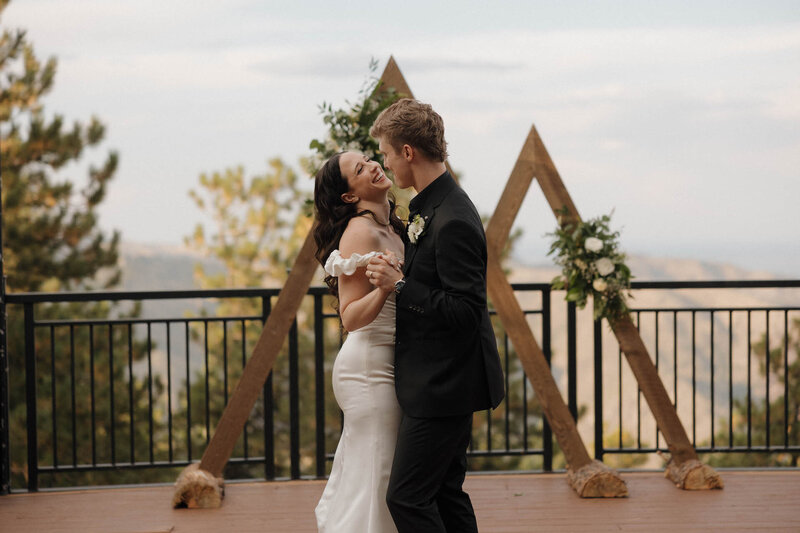 Golden Colorado Wedding Ceremony Event Decor Wood Arch Background