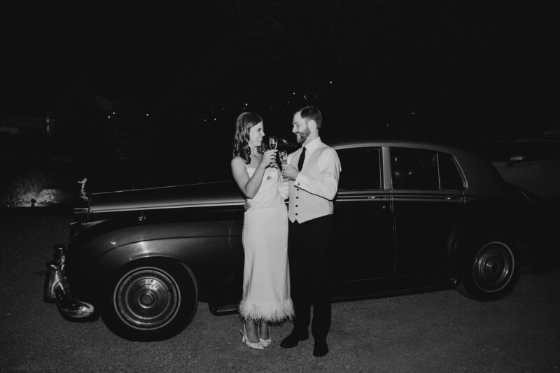 Couple gets into classic car after wedding