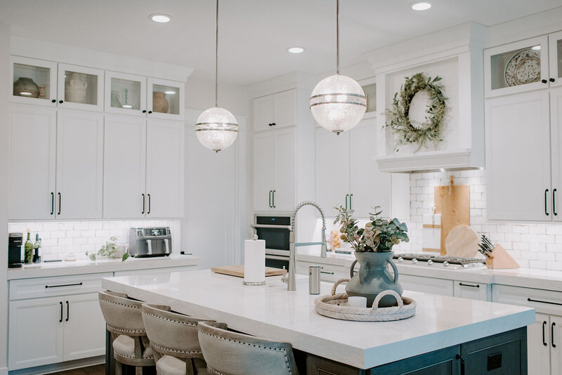 Functional and elegant kitchen featuring timeless finishes, quality cabinetry, and expert layout by Holling Home Interiors.
