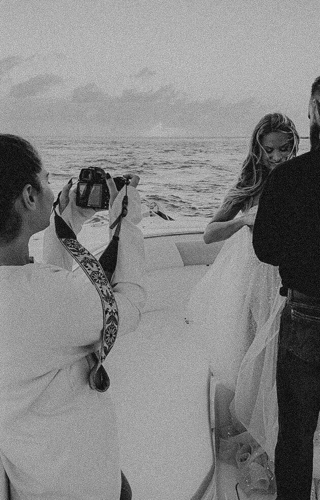 photo of wedding photographer taking wedding photos in florida
