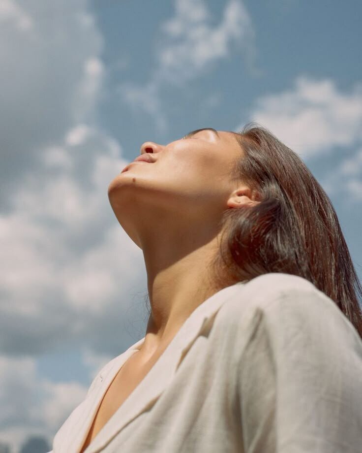 Mindful woman embracing calm and stillness outside