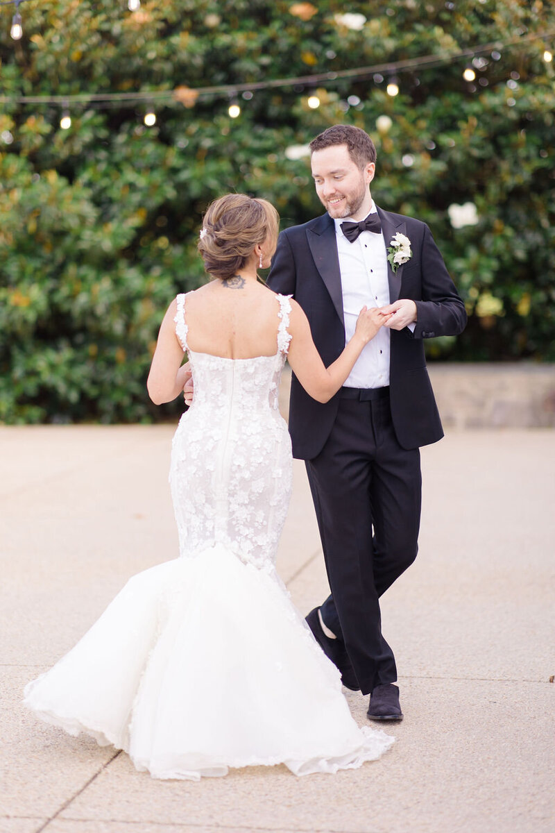 Husband and wife dance together on their wedding day in Virginia