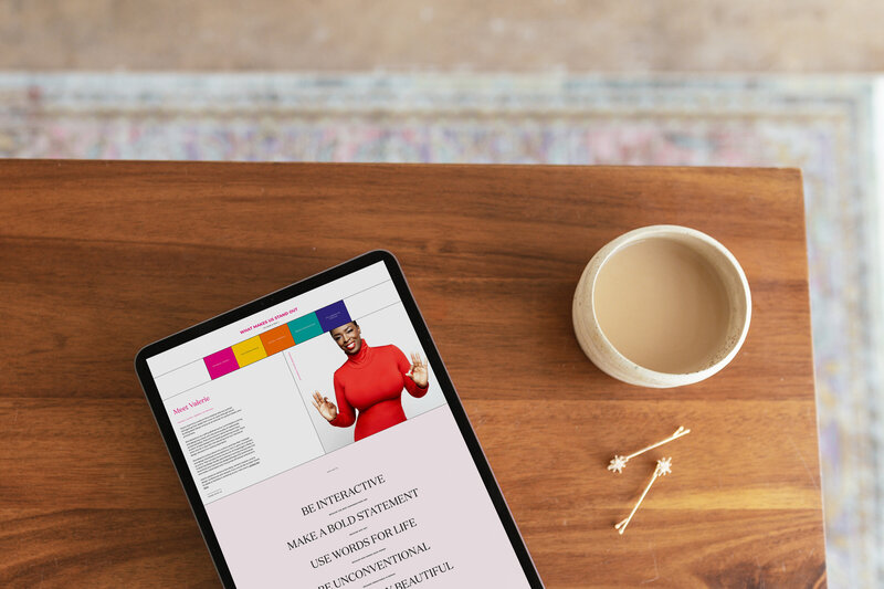 Mockup of showit website design for a book design company on a laptop