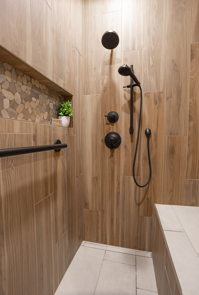 primary-bathroom-shower-wood-like-tile