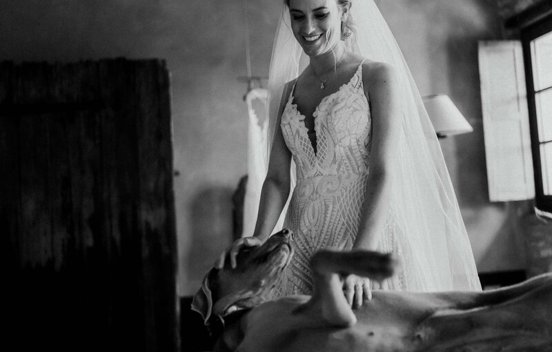 bride getting ready in tuscany candid moment