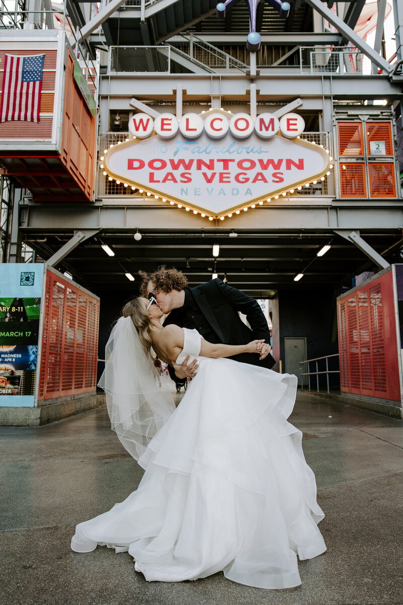 A couple kisses at Fremont Street in Las Vegas