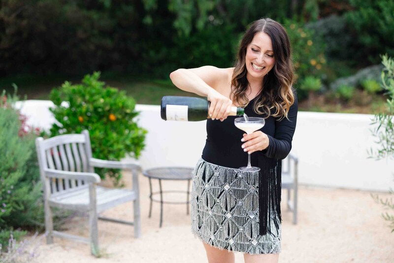 Jordan Duvall holding champagne