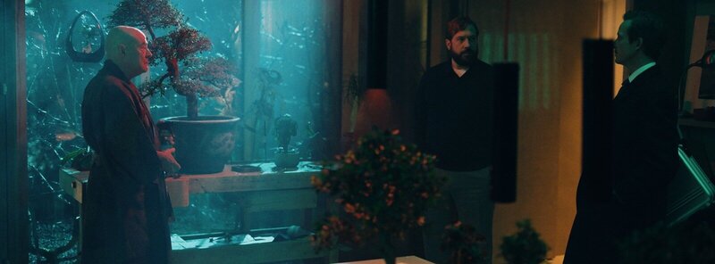 Film still capturing the climax of suspense and action from "Dangerous Truth – Das zweite Attentat."