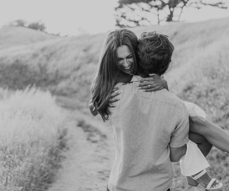 couple with dog on their wedding day