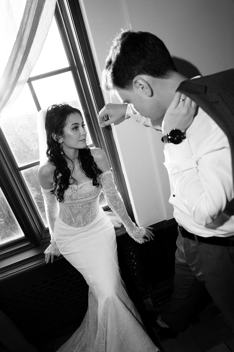 A black and white editorial moment inside of the New College of Florida bay side mansion.