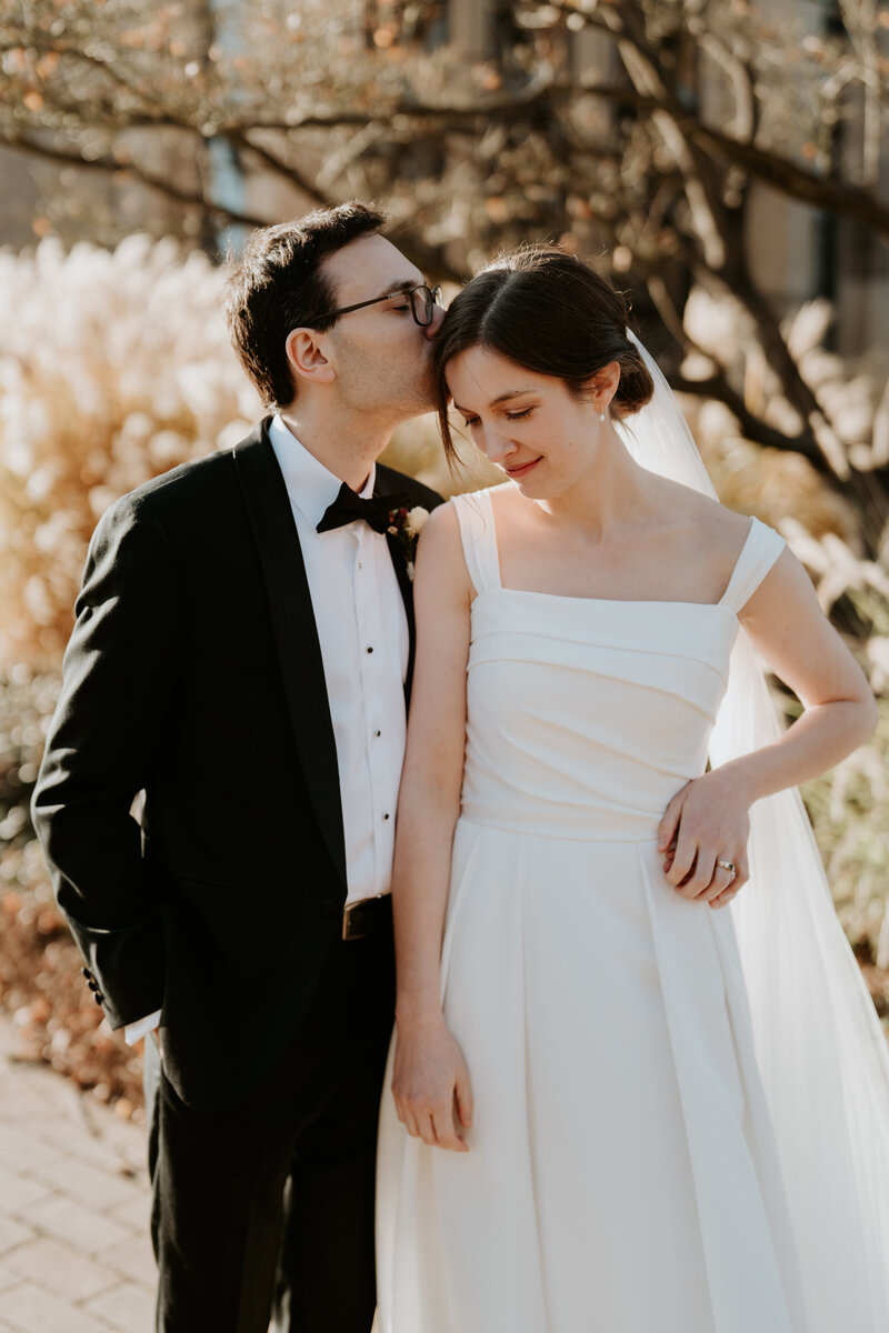 Bride and groom kissing each other after yarra valley wedding