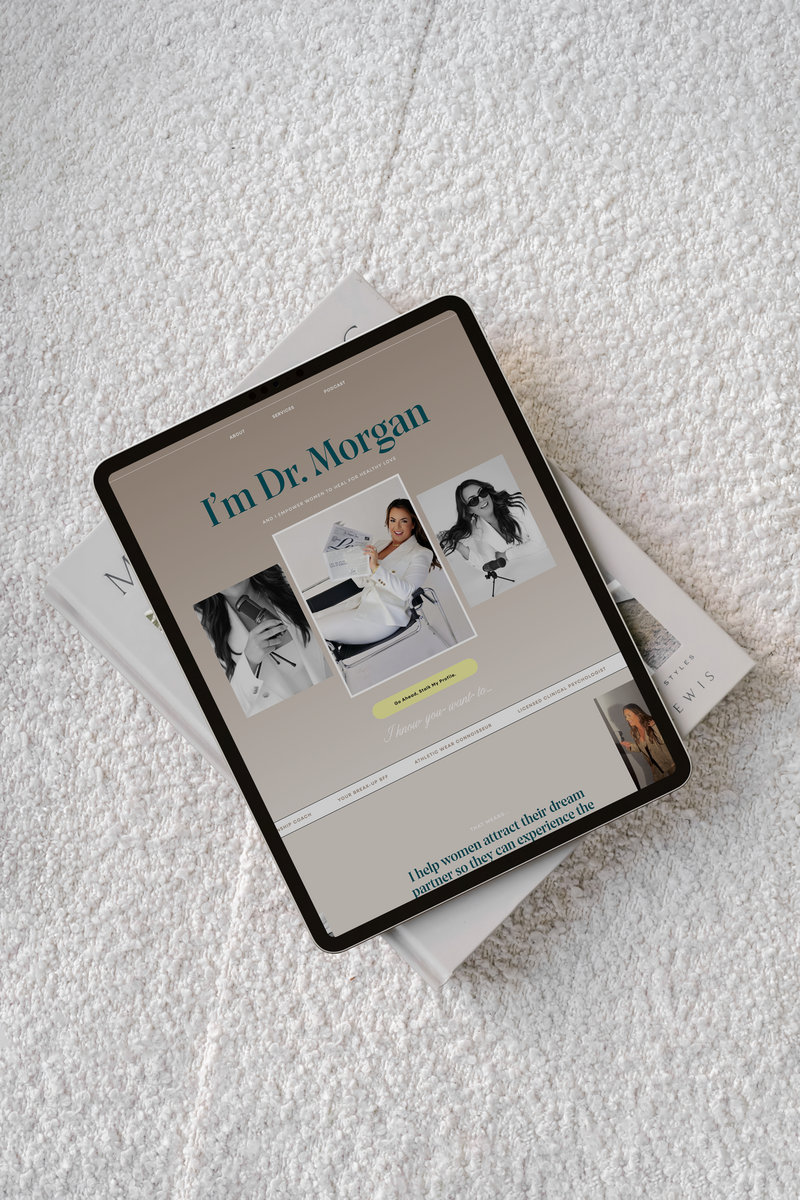 iPad view of relationship coach about webpage on top of book on rug
