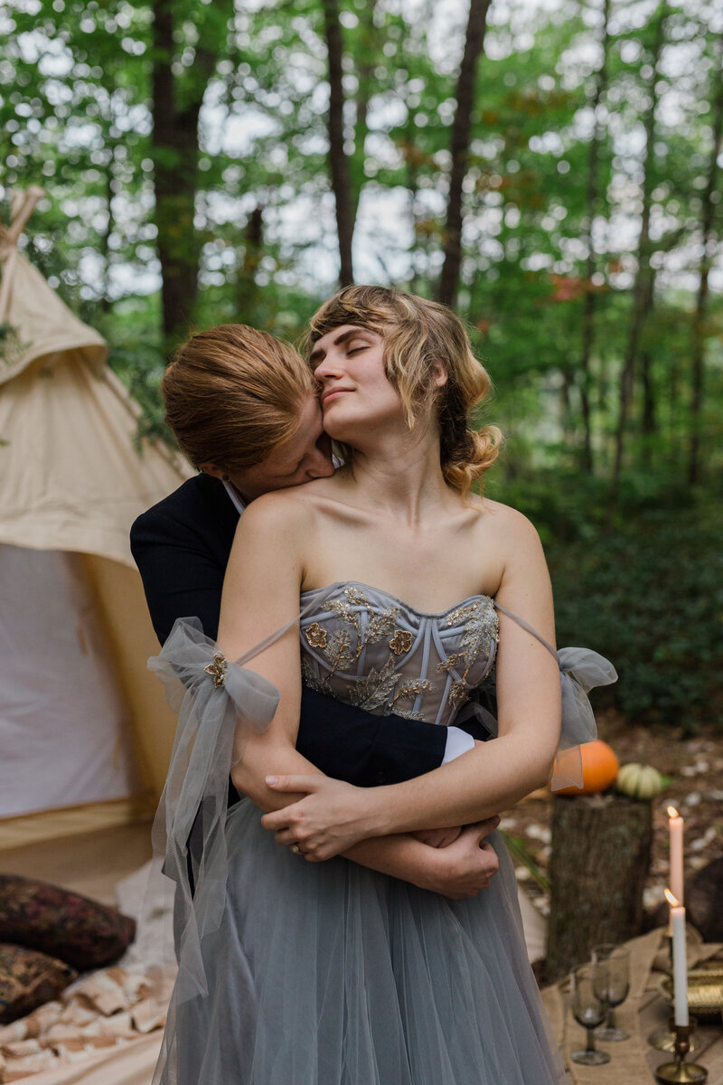 Lesbian couple hug each other at Red River Gorge, Kentucky