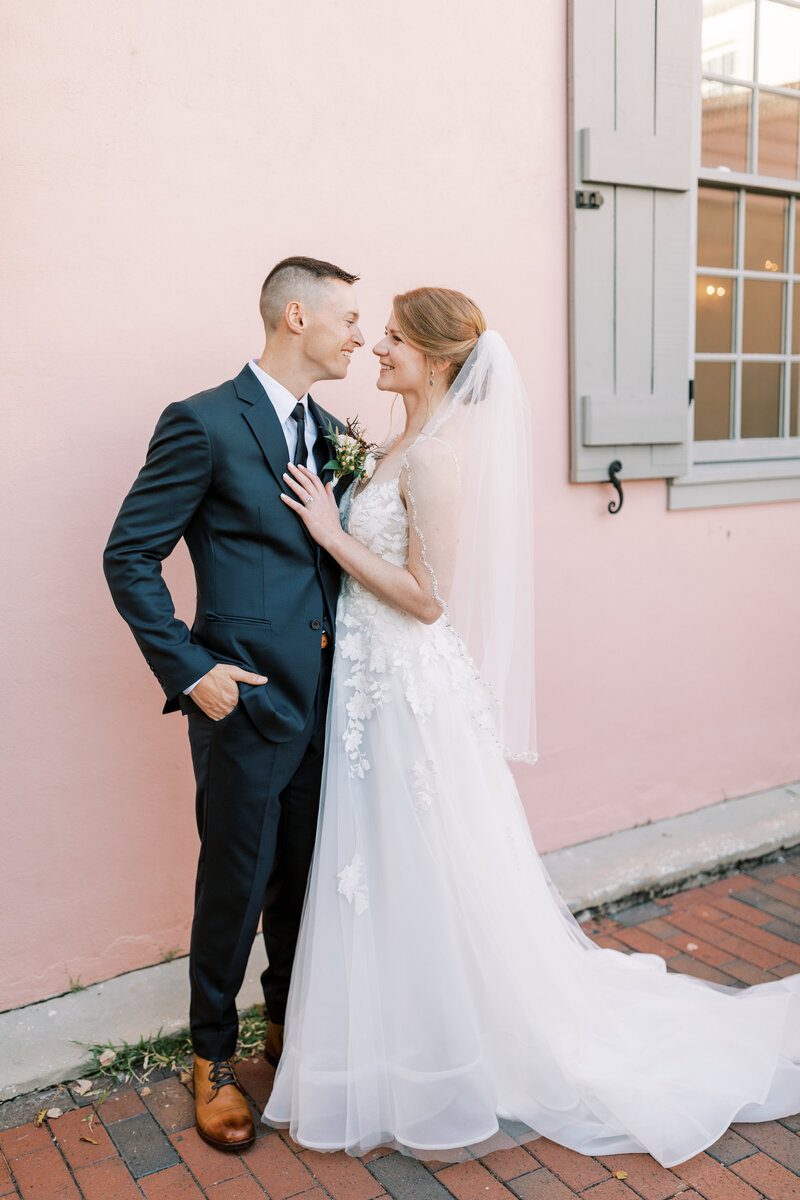 wedding couple poses for portraits at the white room in st. augustine florida