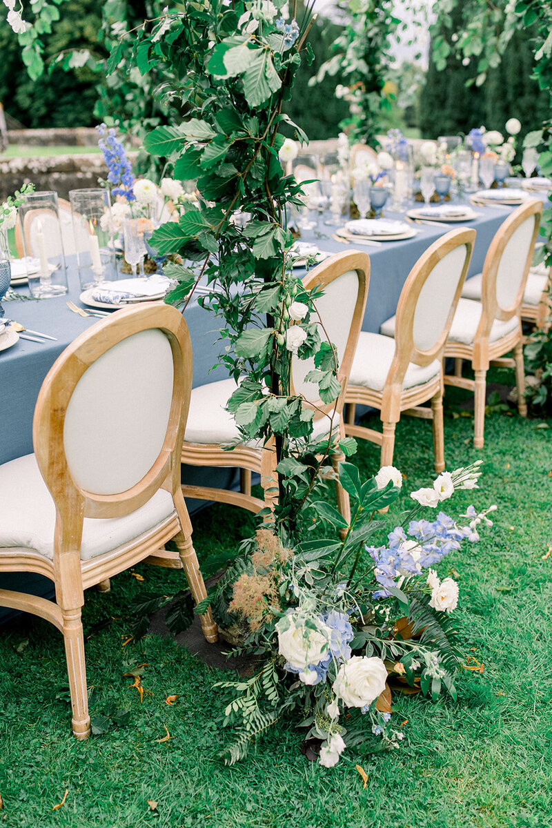 A breathtaking scene from a luxurious beachfront wedding in Pismo, CA, captured by Tiffany Longeway, showcasing the serene beauty of a sunset ceremony by the ocean.