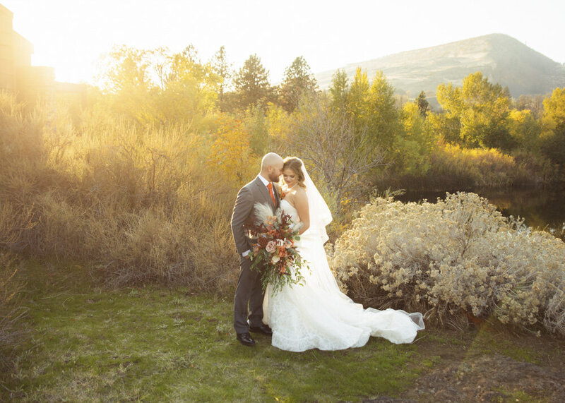bride and groom in field at Union Hill Grange in Sublimity, Oregon