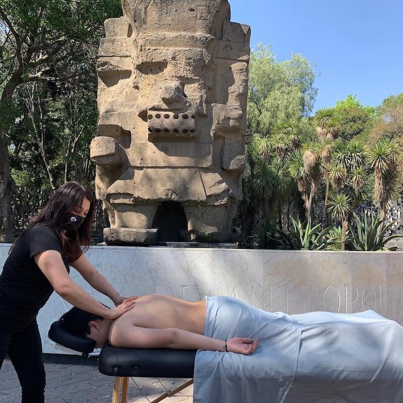 Woman enjoying a relaxing full-body massage at home in Polanco, Mexico City.