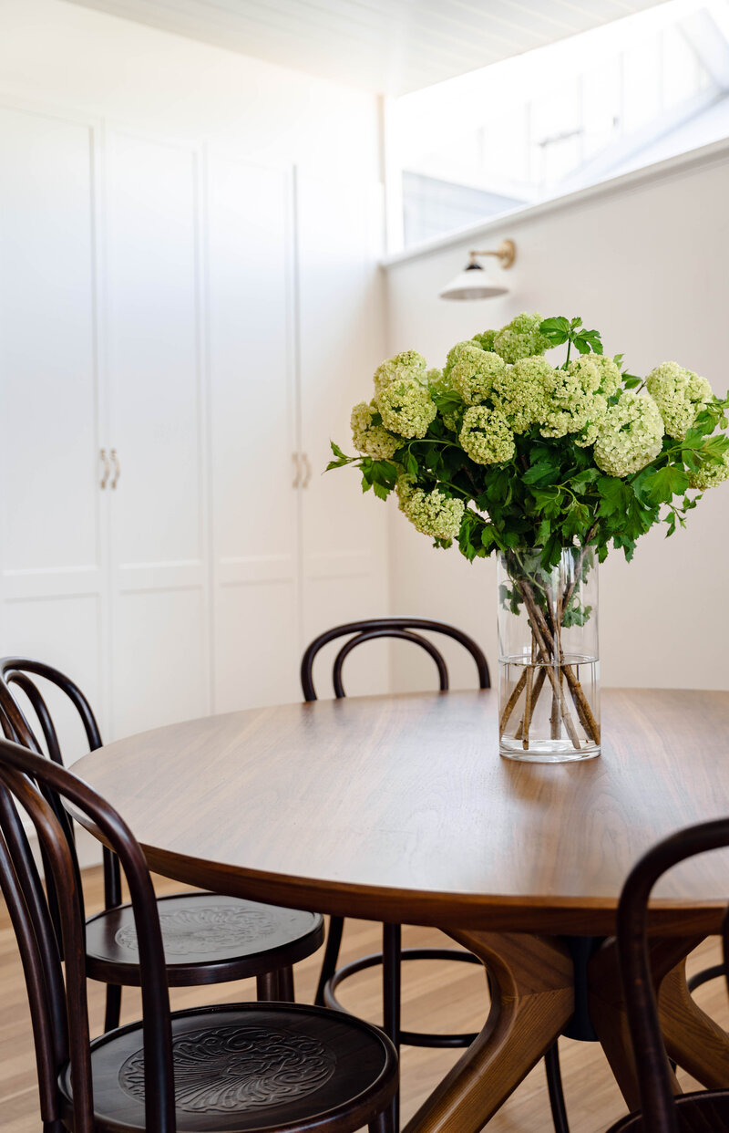 jesse-mccabe-renovation-dining-room-table-flowers-mayfield-nsw
