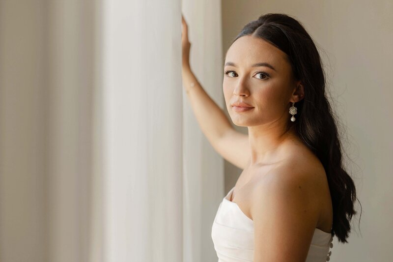 Bride with natural glam makeup and elegant long hair in Madison, WI. Wedding hair and makeup services.