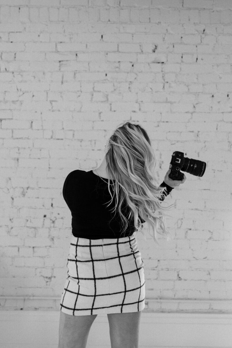 Branding photos taken in a studio setting, showcasing a professional and polished look with clean, intentional styling for business and personal branding.