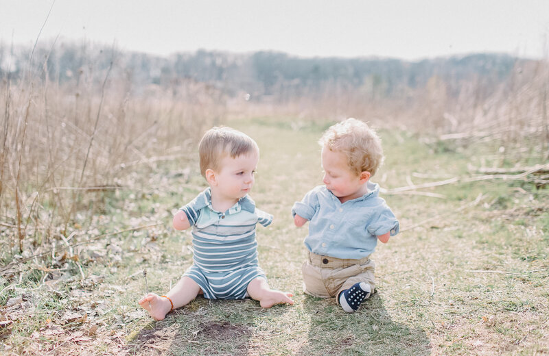 Two young boys with upper and lower limb differences