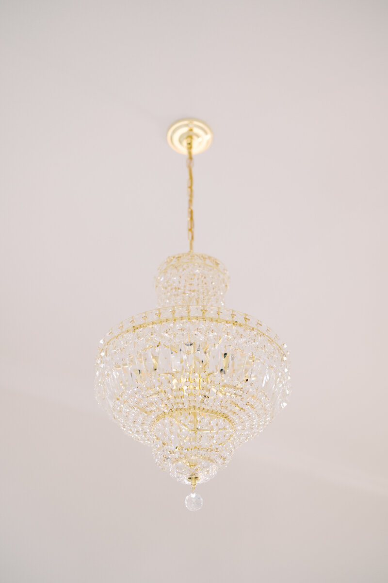 Chandelier detail showcasing lighting design for weddings at venues in North Carolina