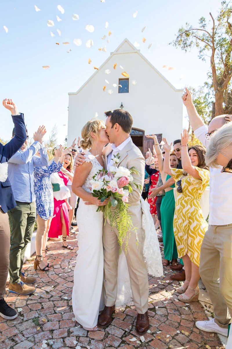 Bride and Groom kissing after ceremony