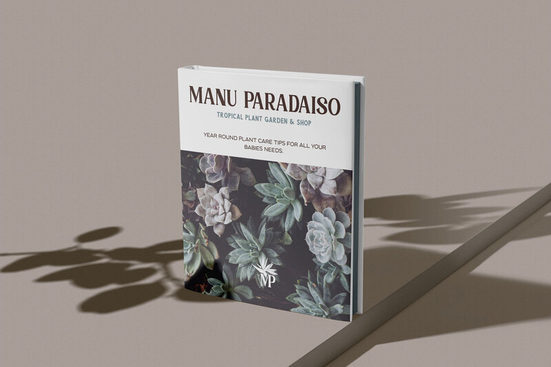 A plant garden book with 'Manu paradaiso' text at the top with a photo of different succulents taking up the bottom of the book.