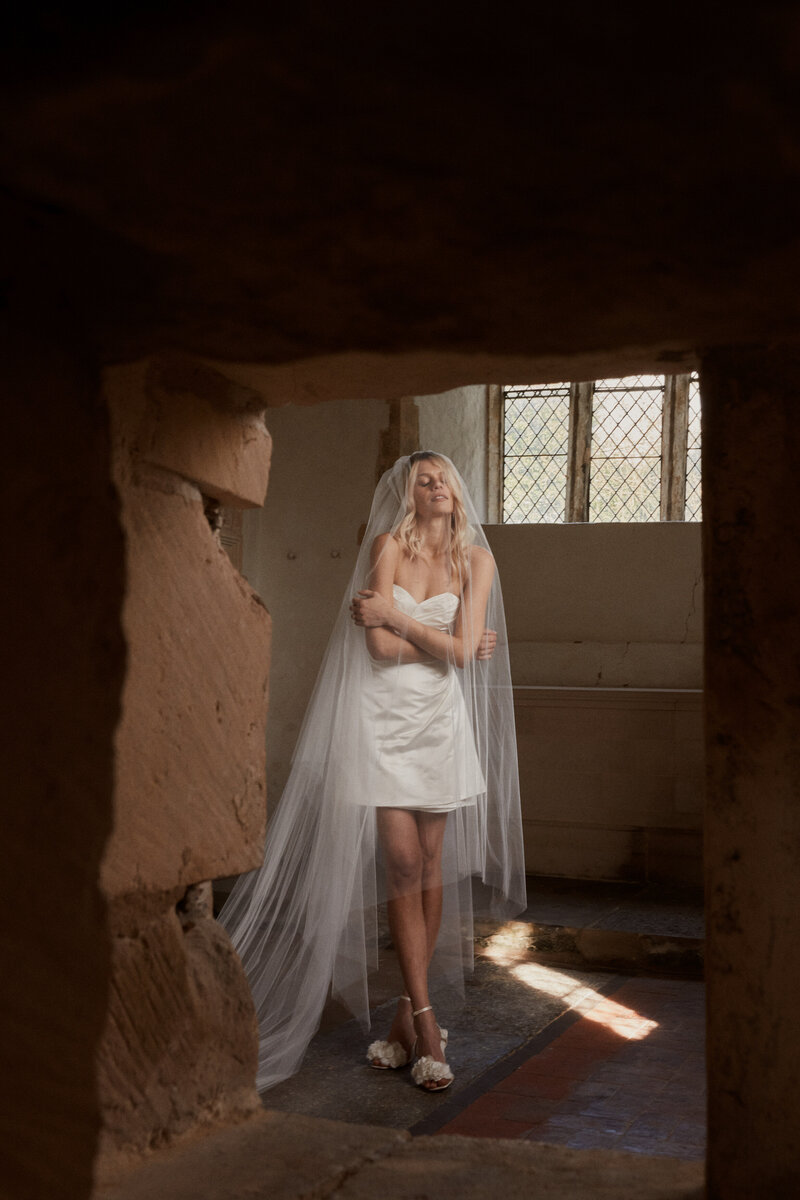 Silk mini wrap wedding dress with sleeves, handmade by British designer Luna Bea