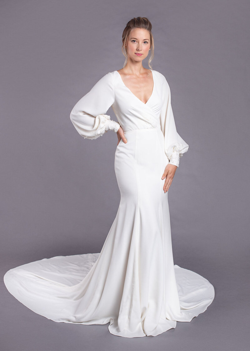 Full bishop fit and flare wedding dress with long sleeves