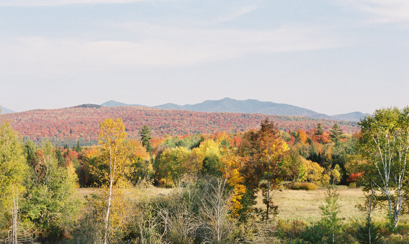 adirondack mountains in the fall with beautiful colors photographed on a wedding day