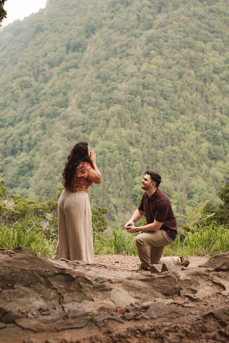 candid photo of a surprise photo, adventurous couple