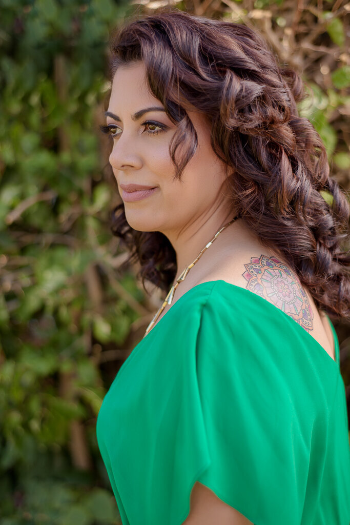 woman with a mandala tattoo on her back shoulder