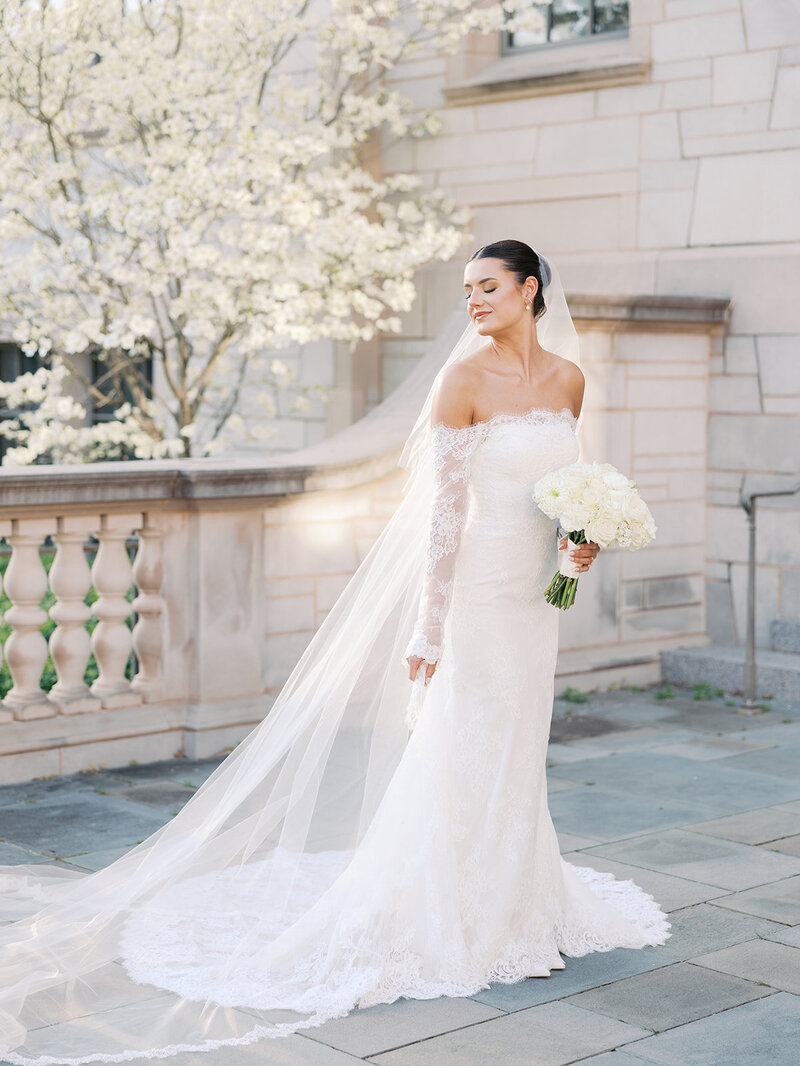 Bride and groom walk up memorial steps at their DC wedding