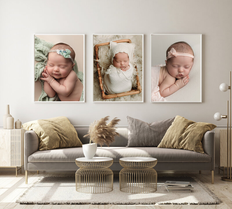 Three white framed images of fine art newborn baby photos sleeping