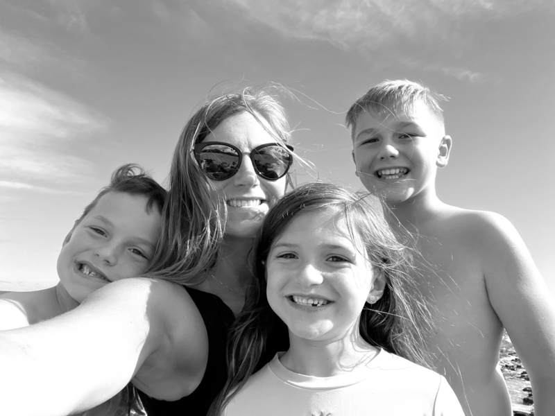 Mother and kids on beach 