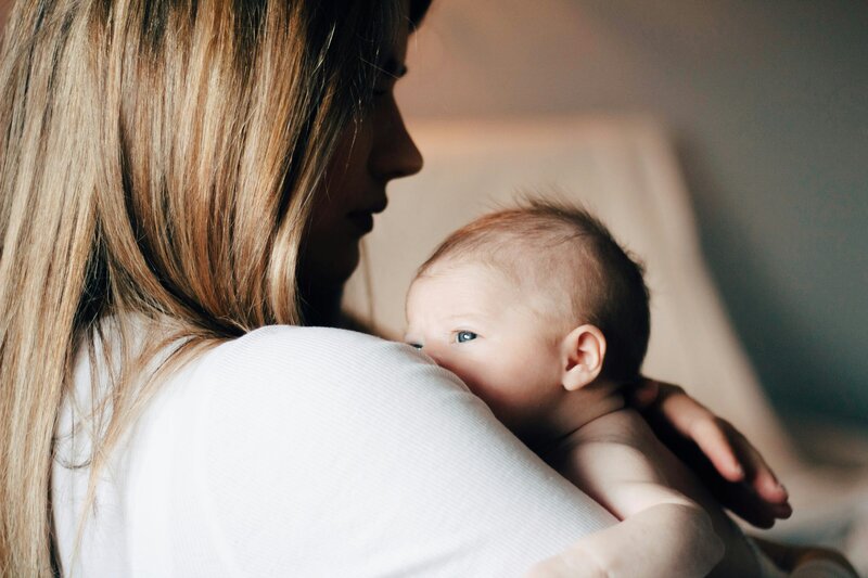 Woman holding newborn