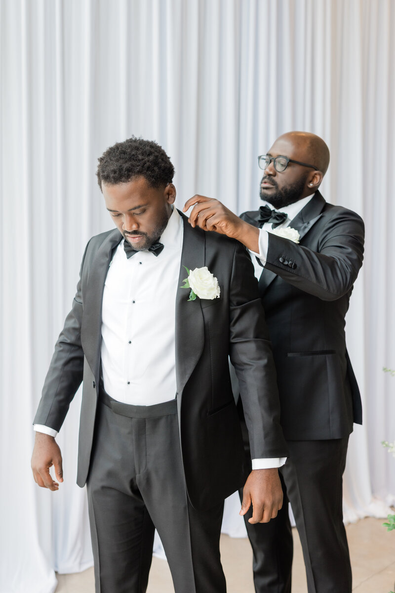 Groom Getting Ready before his wedding at the Ben, Autograph Collection in West Palm Beach with best man