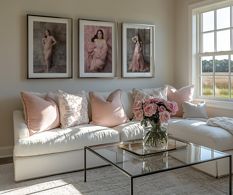 Framed maternity portrait above living room couch