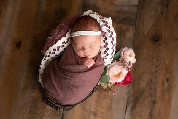 Slinger Wisconsin Newborn photo session baby posed in prop during studio session | Glory Be Photography by Tara Bos