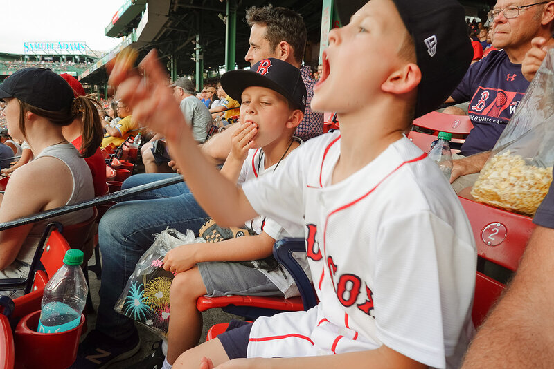Family photo at a baseball game