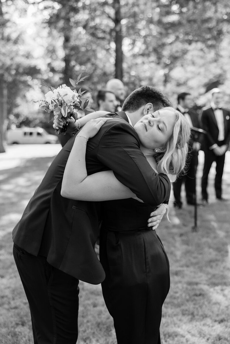maid-of-honor-hugs-groom